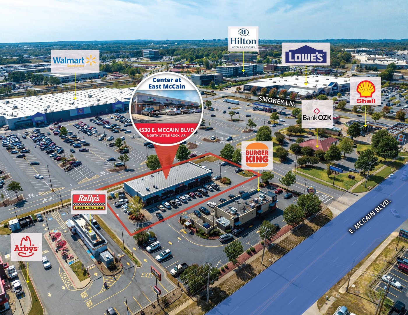 Center at East McCain adjacent to Walmart Supercenter, with nearby retailers labeled
