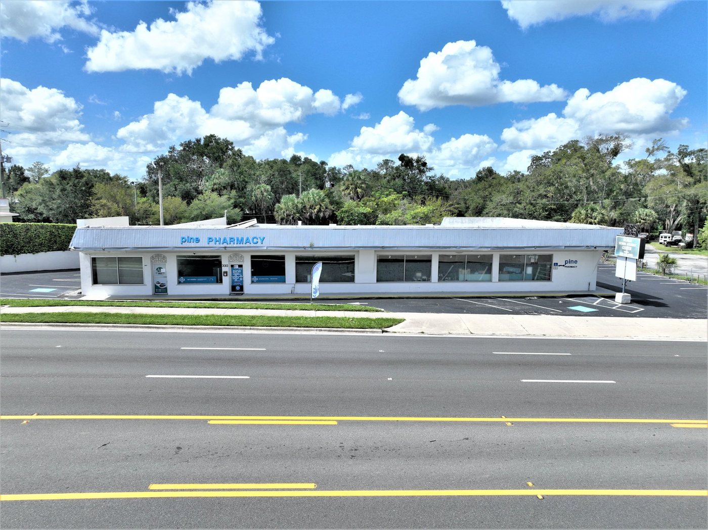 Street-level view of Pine Avenue Plaza from South Pine Avenue in Ocala, Florida