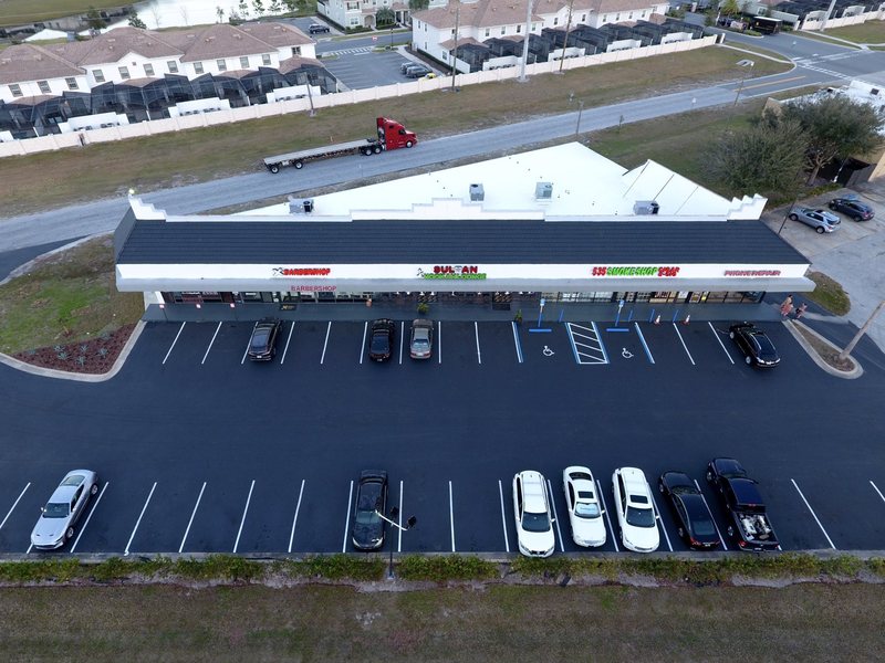 Aerial view of the Vineland Plaza roofline with the surrounding residential area